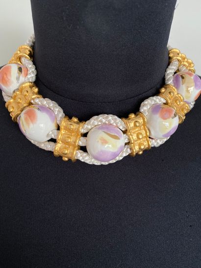 null White corded choker necklace with gold plated ties and painted ceramic balls...