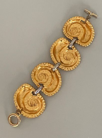 null EDOUARD RAMBAUD Paris Gilt metal bracelet with four snail links connected by...