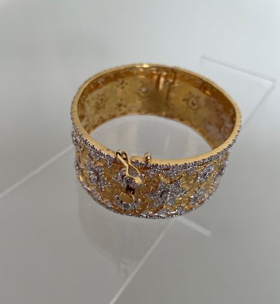 null Rigid articulated bracelet in gilded metal decorated with zirconium oxides in...