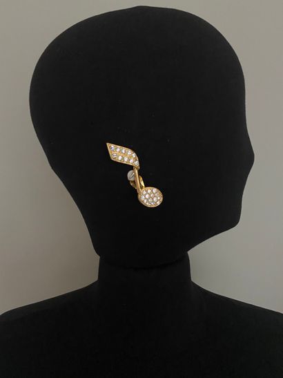 null YVES SAINT LAURENT Made In France by ROBERT GOOSSENS Pair of gold metal and...