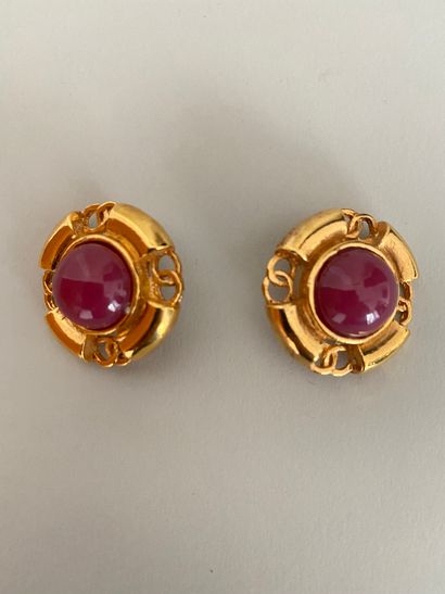  CHANEL Made in France Pair of round ear clips in gilded metal with the brand's number...