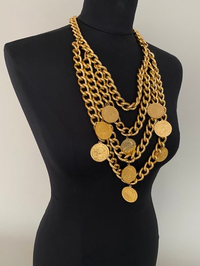 Multichain necklace with gold metal dollar...