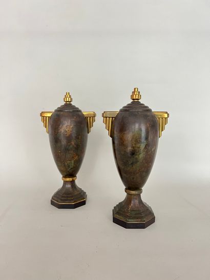 null 
A.SADOUX Pair of green marbled metal ovoid urns with gilded brass steps on...