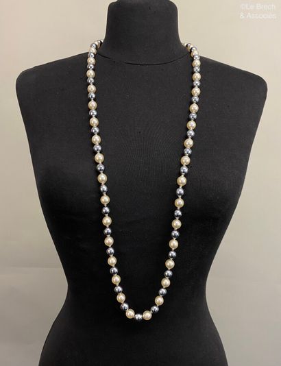 null CELINE Long necklace of white and grey pearly pearls with a golden metal ball...