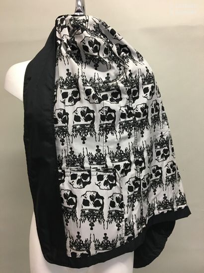 null COMME DES GARCONS Jacket in black composite material and crowned skull print...