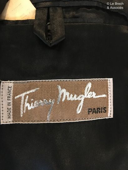 null 
THIERRY MUGLER Paris Jacket in black wool with leather trim and snap closure...