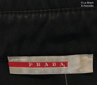 null 
PRADA Black composite shirt with snap closure and zippered pockets - Size seems...
