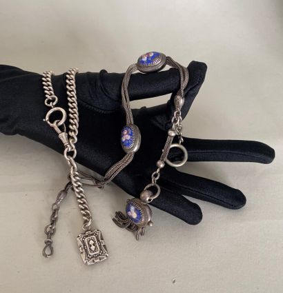 null Lot of 2 silver watch chains 925 thousandths, one with a charm and the other...