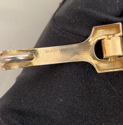 null CHRISTIAN DIOR Bracelet articulé en metal doré circa 70 - signé 

(légère usure...
