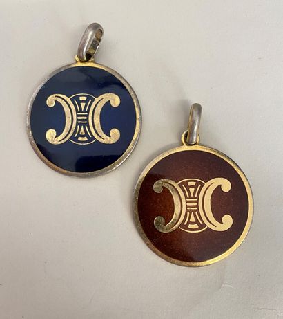 null CELINE 2 Pendants in gilded metal and enamel with the initials of the brand...
