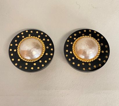null CHANEL Made in France by KARL LAGERFELD Pair of ear clips in gold plated metal...