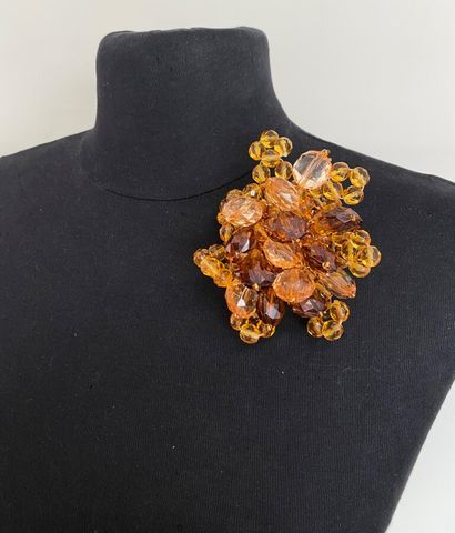 Gold resin flower brooch with amber and brown...