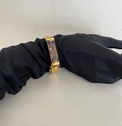 null GOOSSENS by Emmanuel AUBRY Rigid articulated bracelet in gold metal and smoked...