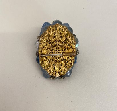 null Attributed to CHANEL Gilded metal brooch with pear-shaped cabochons of bluish...