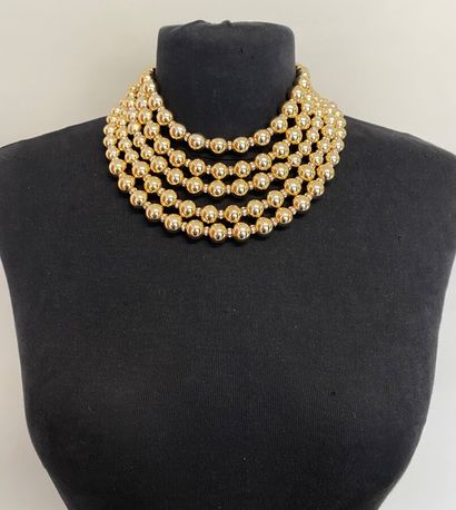 null CHRISTIAN DIOR Necklace of 5 rows of golden resin balls and rhinestone rings...
