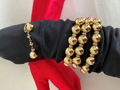  CHRISTIAN DIOR 3-row bracelet and ear clip with gold-plated metal balls and small...