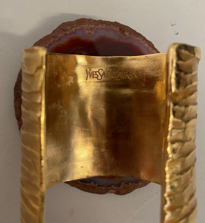 null 
YVES SAINT LAURENT Cuff in pleated gold metal and brown agate plate with applied...