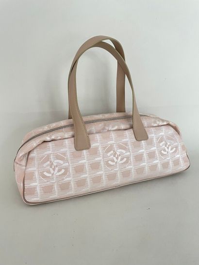 CHANEL Made in Italy Baguette bag in monogrammed...