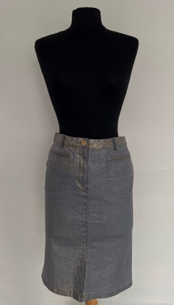 CHANEL Denim skirt with gold button and brand...