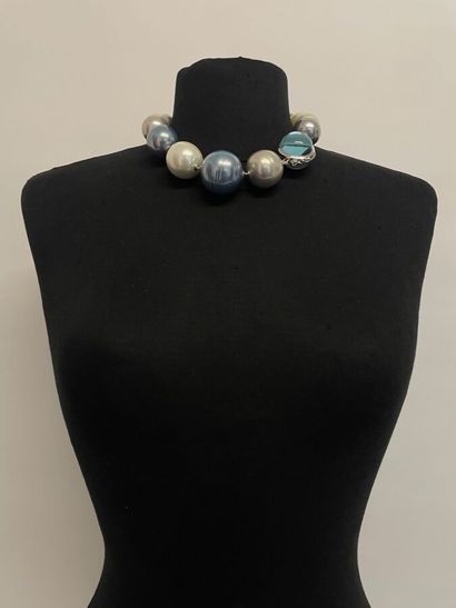 null Necklace made of large white and grey pearly beads with a half ball clasp of...