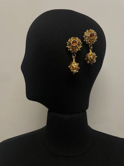 null Pair of gold plated metal ear clips with amber rhinestone glass cabochons and...