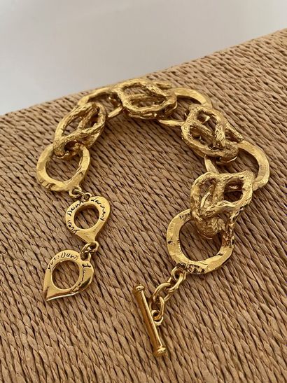 null YVES SAINT LAURENT Made in France Bracelet en métal doré à anneaux circulaires...