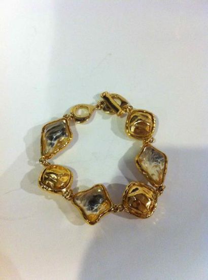 YVES SAINT LAURENT Bracelet en métal doré à motifs dorés et cabochons de verre translucides-...