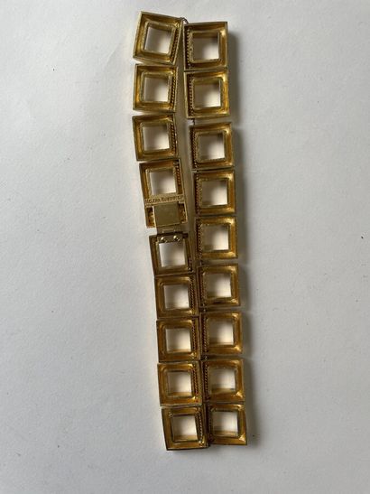 null HELENA RUBINSTEIN Collier composé de carrés ajourés en métal doré brossé - signé...