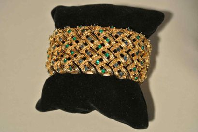 MARCEL BOUCHER n° 9288B Bracelet ruban en métal doré, orné de strass bleus et verts...