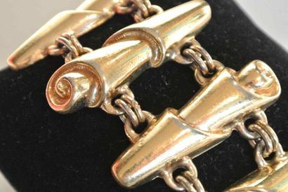 Paco RABANNE Bracelet en métal doré à décor de volutes - Longueur : 20 cm - Length...