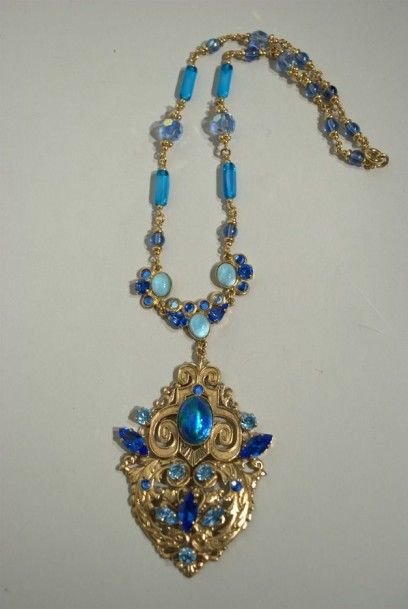 HENRY Collier à pendant en métal doré et perles de verre bleu turquoise