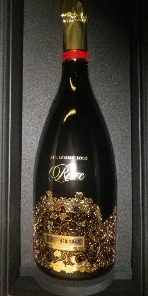 null 1 Bouteille CHAMPAGNE PIPER HEIDSIECK "Cuvée rare" 2002 Coffret.