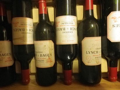 null 12 Bouteilles CHÂTEAU LYNCH BAGES 2001 Etiquettes tachées. Labels stained.