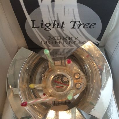 null SWATCH. "Light Tree" montre veilleuse pieuvre éclairante à 5 lumières.
