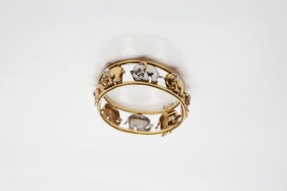 null Bracelet jonc en or 750 millièmes ajouré figurant une ronde d'éléphants en or...