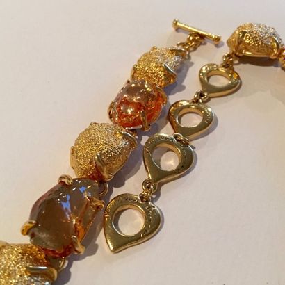 null YVES SAINT LAURENT

Parure "pépite" comprenant un collier, un bracelet et une...