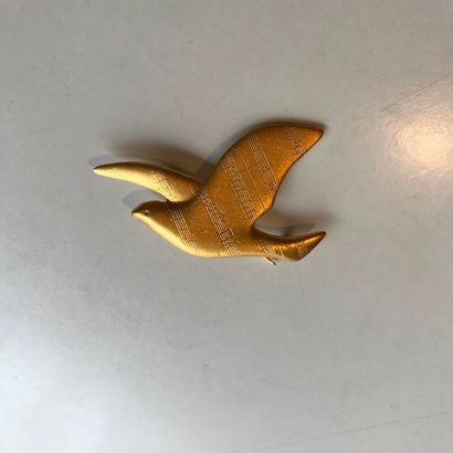 null MAGRITTE 

Broche colombe en métal doré edition ADAGP 2001 

Largeur : 6 cm