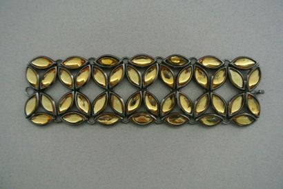 null Bracelet articulé en métal noirci à motifs feuille orné de strass de résine...