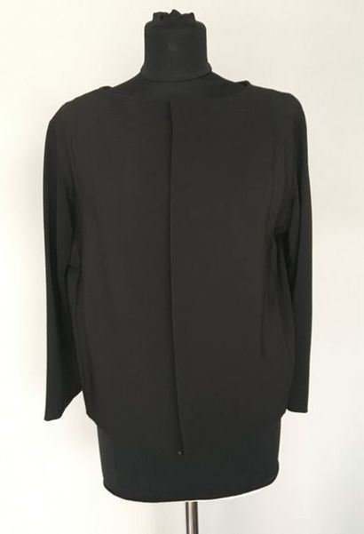 null JACQUES HEIM Haute Couture 

Veste courte en soie noir à noeud - circa 60 -...