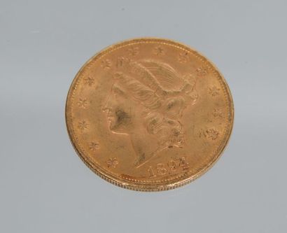 Pièce de 20 dollars en or datée de 1894....