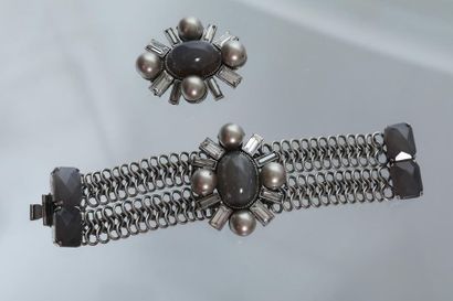null PHILIPPE FERRANDIS 

Demi-parure composée d'un bracelet et d'une broche pendentif...
