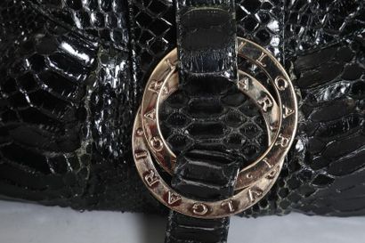 null BULGARI Made in Italy

Sac porté épaule " Chandra " en python noir, bijouterie...