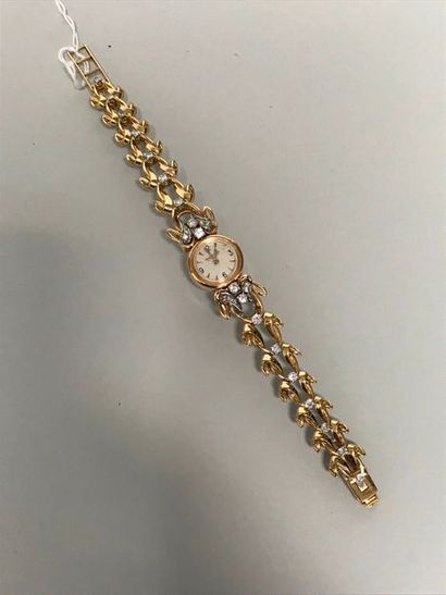 null JAEGER LECOULTRE
Bracelet montre de dame en or 750 millièmes et diaments Poids...