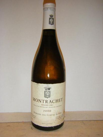 null 1 bouteille MONTRACHET - COMTES LAFON 2000 Étiquette tachée. Label stained.