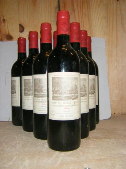 null 10 bouteilles DUHART MILON ROTHSCHILD 1986 Etiquette légèrement marquées ; niveaux...