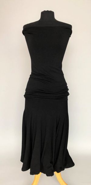 null COMME DES GARCONS par JUNYA WATANABE 

Robe bustier en lainage noir, jupe à...