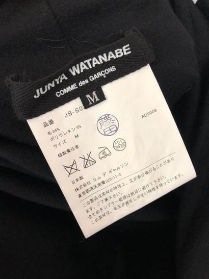 null COMME DES GARCONS par JUNYA WATANABE 

Robe bustier en lainage noir, jupe à...