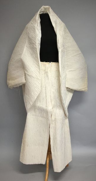 null ANGELO FIGUS

Ensemble tunique et Pantalon en raphia blanc, circa 2000 - Taille...