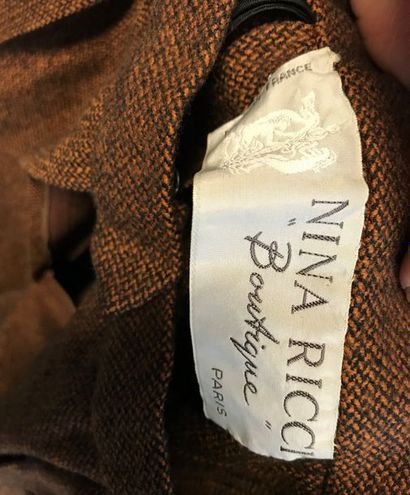 null NINA RICCI Boutique 

Ensemble Pantalon en lainage chiné brun et Veste imperméable...