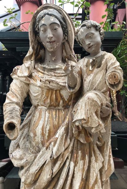 null Vierge à l'Enfant en bois sculpté, doré et polychromé. 

Travail du XVIIème...